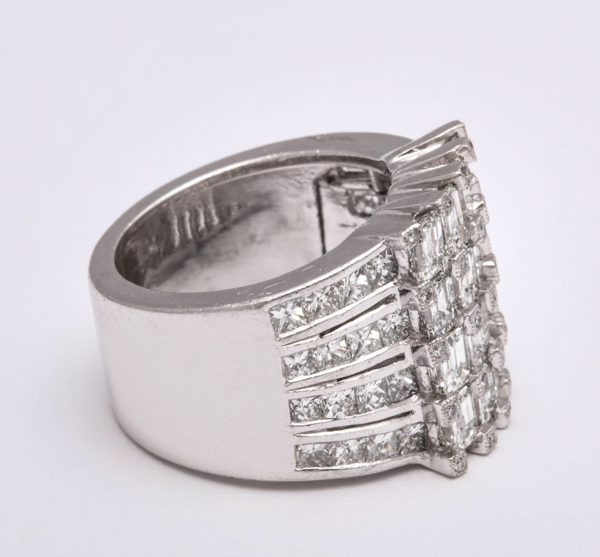 Wide Platinum Ring with Emerald and Princess Cut Diamonds