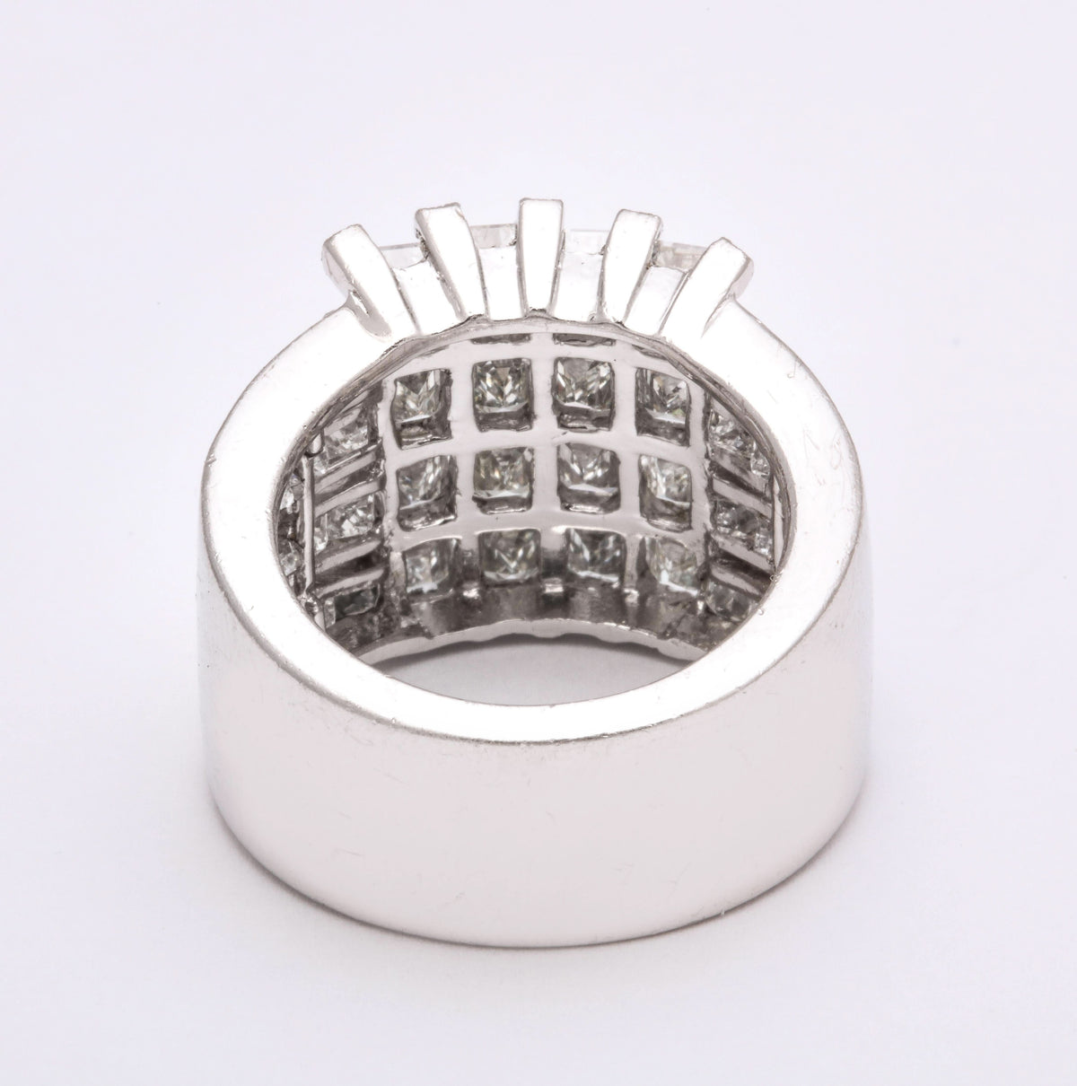 https://a.1stdibscdn.com/wide-emerald-and-princess-cut-diamond-ring-for-sale-picture-2/j_415/1603216142423/6R1A9911_master.jpg