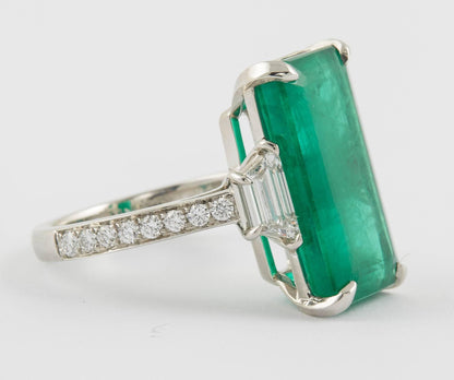 Exquisite 10 Carat Elongated Green Emerald Platinum Diamond Statement Ring