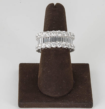 https://a.1stdibscdn.com/wide-8-carat-baguette-and-round-diamonds-gold-eternity-band-ring-for-sale-picture-3/j_415/j_95793121590588135557/781A7200_master.jpg