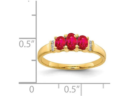 3/4 Carat (ctw) Natural Ruby Three Stone Ring in 14K Yellow Gold