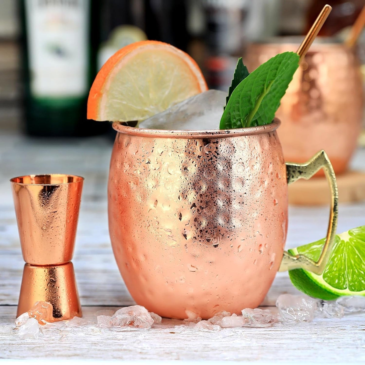Moscow Mule Mugs Copper Mule Cup Kit 18Oz Set of 4 with Handle Large Copper Hammered Plating Cups with 0.5Oz Double Jigger, Stainless Steel Straws, Spoon for Cold Drinks Cocktails Wine