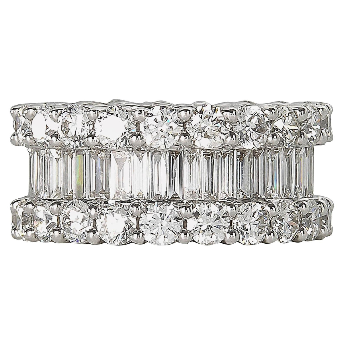 https://a.1stdibscdn.com/wide-8-carat-baguette-and-round-diamonds-gold-eternity-band-ring-for-sale/1121189/j_95793121590708817136/9579312_master.jpg