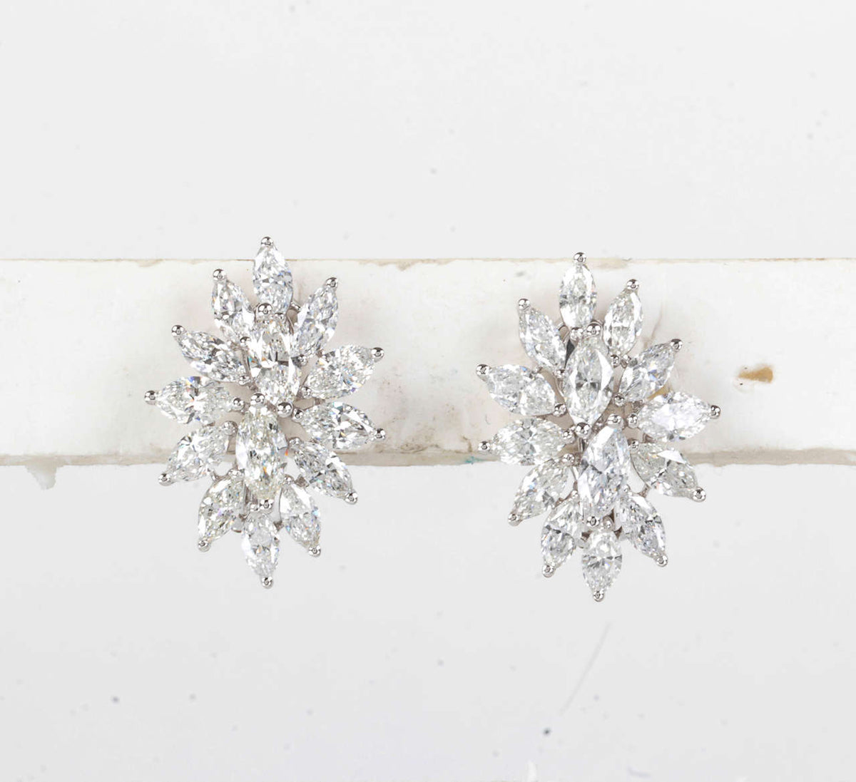 https://a.1stdibscdn.com/diamond-cluster-earrings-for-sale-picture-3/j_415/j_168437421661970102221/IMG_8950.jpg