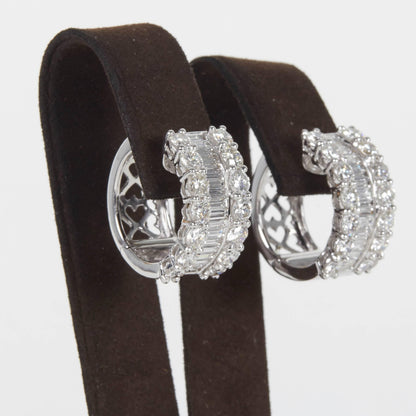 https://a.1stdibscdn.com/round-and-baguette-diamond-gold-huggie-hoop-earrings-for-sale-picture-5/j_415/j_108071121605212597355/IMG_1552_master.jpg