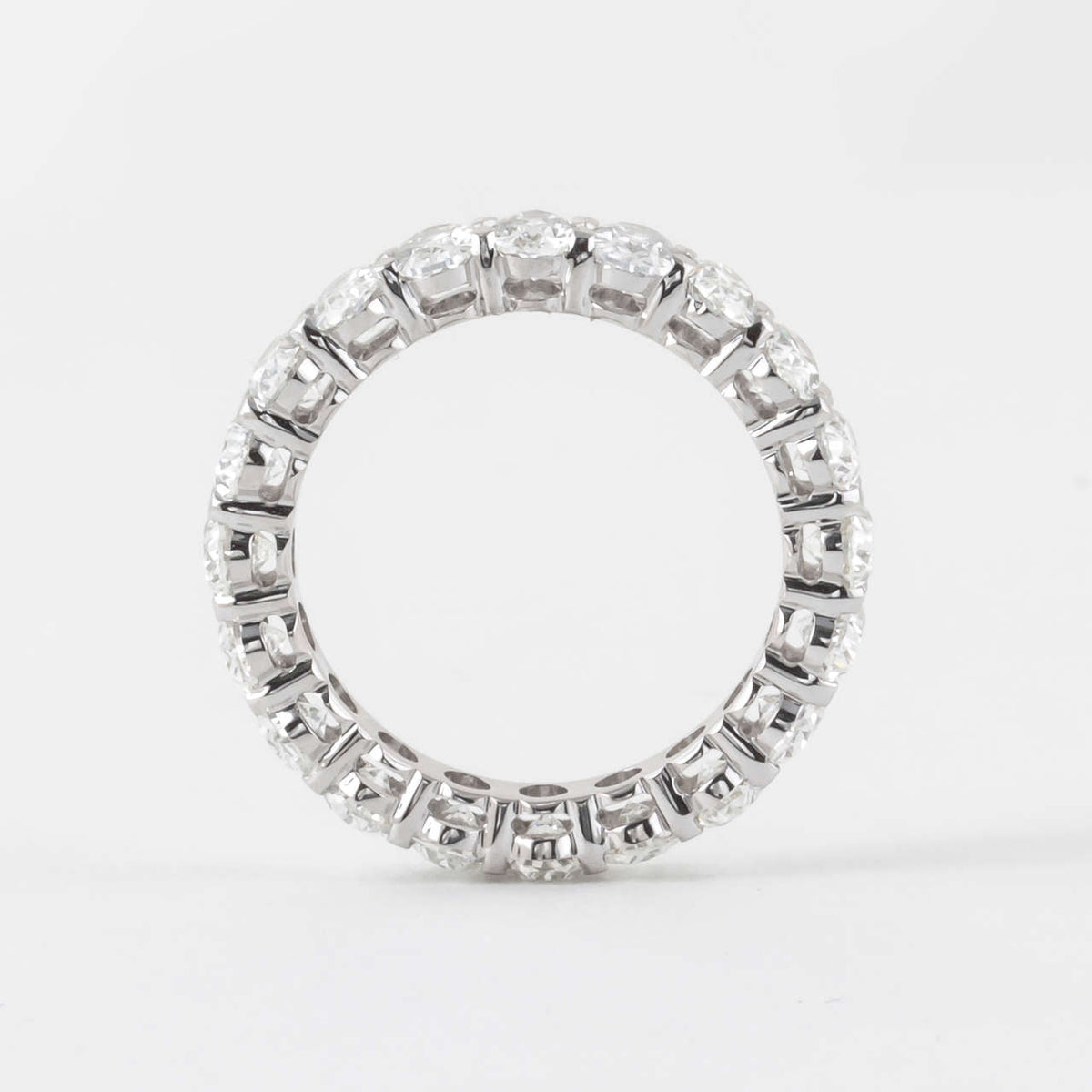 Exquisite 4.86 Carat Oval Diamond 18k White Gold Eternity Band