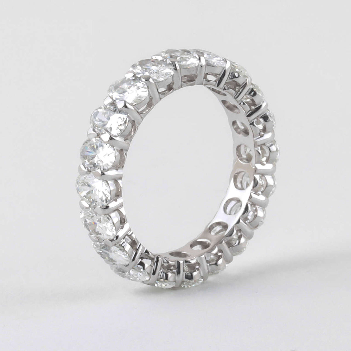 Exquisite 4.86 Carat Oval Diamond 18k White Gold Eternity Band