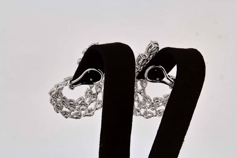 Diamond Scene Stunning 15.49ct Pear Shaped Diamond Gold Swirl Earrings
