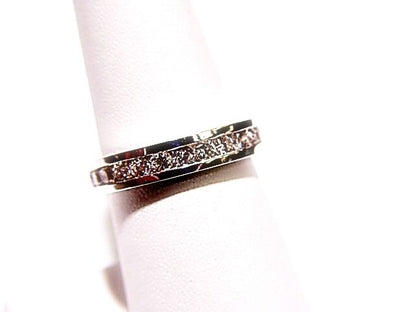 DIAMOND CHANNEL SET ALL THE WAY AROUND THE BAND ETERNITY