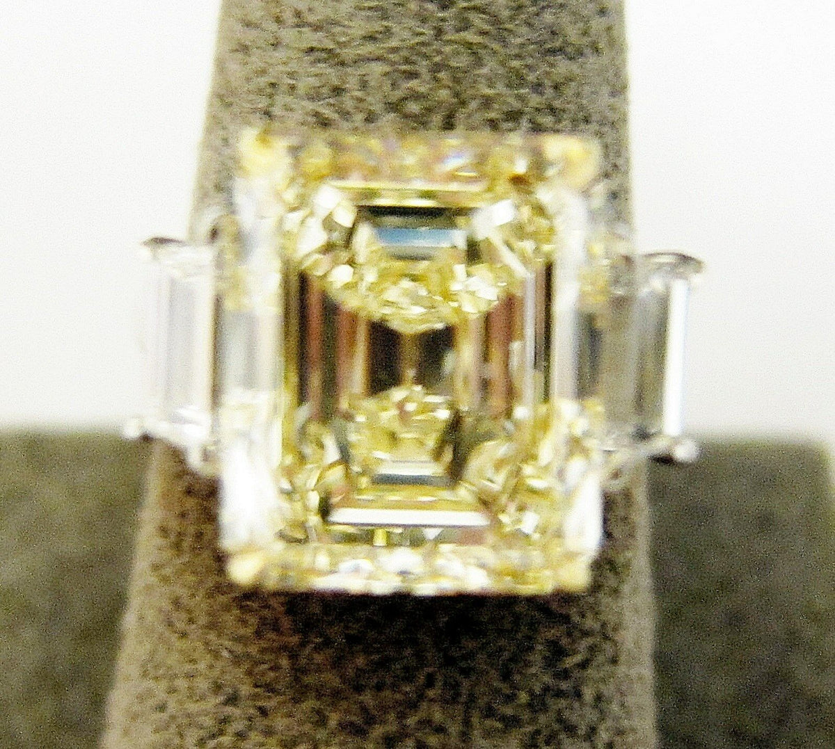 FANCY LIGHT YELLOW DIAMOND DIAMOND TWO TRAPEZOID ENGAGEMENT RING
