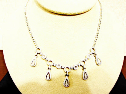 DIAMOND NECKLACE ROUND BAGUETTE FIVE PEAR OUTLINE DROP