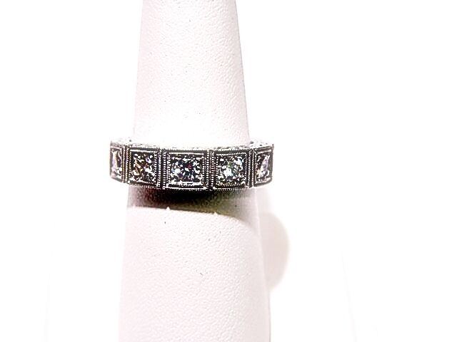 8 DIAMONDS SET 3/4 WAY DOWN FOR AN ALL AROUND LOOK