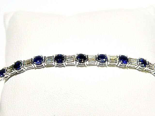 SAPPHIRE 17 STONE ROUND SHAPE DIAMOND 34 STONE BAGUETTUE