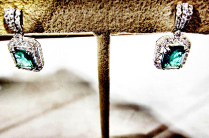 EMERALD RECTANGULAR SHAPE SET ROUND DIAMOND DANGLE EARRING