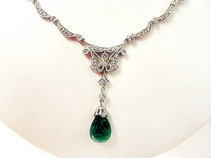 EMERALD BRIOLETTE SHAPE DIAMOND ROUND BRILLIANT SHAPE