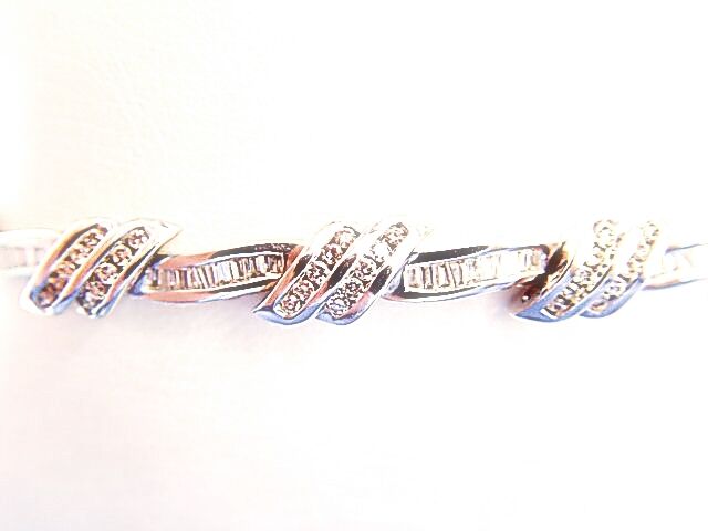 ROUND BRILLIANT CUT AND BAGUETTE CUT CHANNEL SET DIAMOND