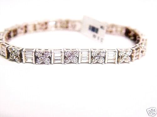 75 ROUND BRILLIANT CUT AND 45 BAGUETTE CUT DIAMOND TENNIS BRACELET