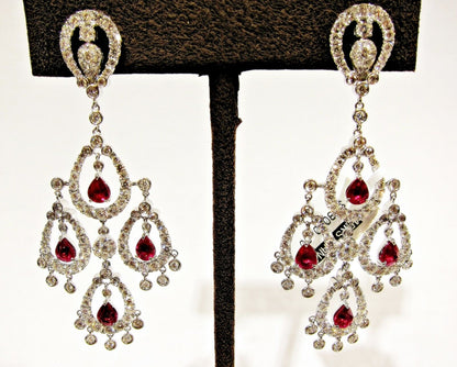 RUBY PEAR SHAPE EIGHT STONE SET WITH WHITE ROUND BRILLIANT