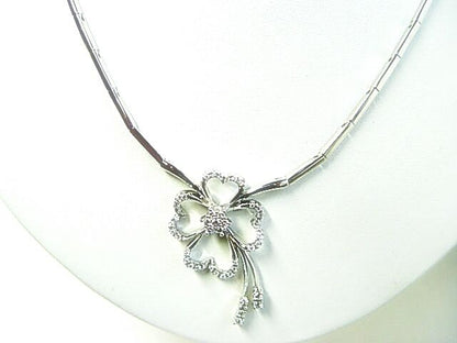 DIAMOND ROUND BR SHAPE PRONG SET FLOWER CENTER SET BAR
