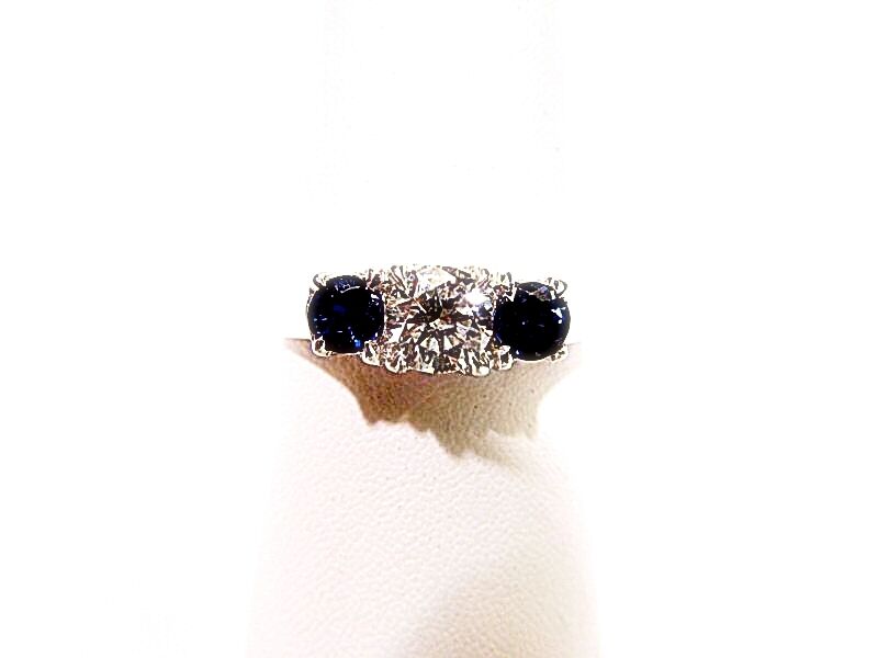 .80 CT 2 SAPPHIRE SHAPE SIDE STONE 1 ROUND BRILLIANT SH .61 CT DIAMOND 18 K GOLD