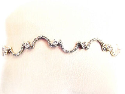2.48 CT 11 PRINCESS SHAPE DIAMOND SET ROUND BRILLIANT SH DIAMOND SWIRL BRACELET