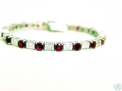 18 ROUND SHAPE RUBIES 11.10 CT AND 36 BAGUETTE SHAPE DIAMOND 3.42 CT 18 K WHITE
