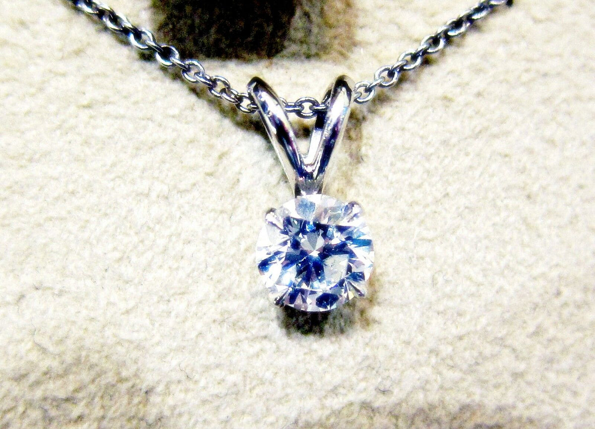 DIAMOND ROUND BRILLIANT SHAPE SOLITAIRE WITH BALE DIAMOND PENDANT SOLITAIRE