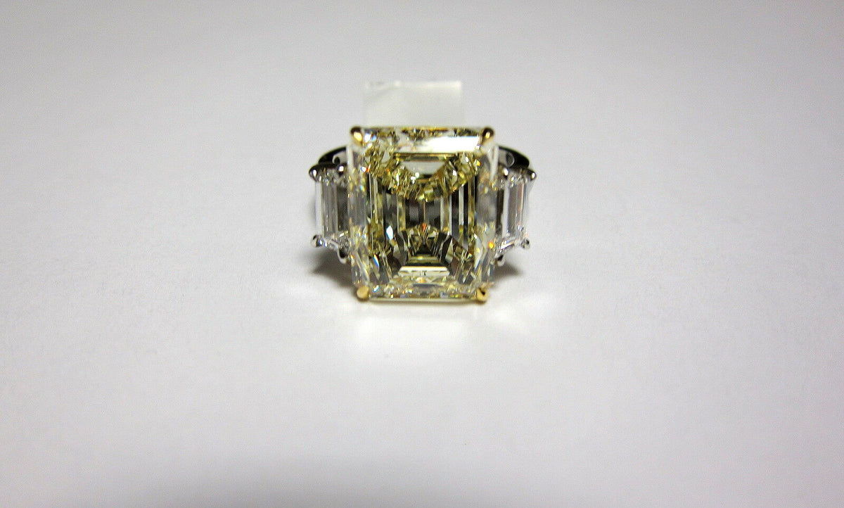 FANCY LIGHT YELLOW DIAMOND DIAMOND TWO TRAPEZOID ENGAGEMENT RING