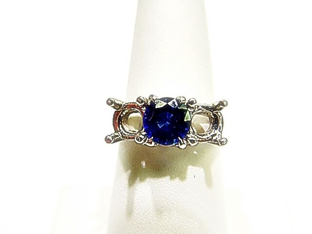 3.54 CT SAPPHIRE BLUE SAPPHIRE ROUND SHAPE SETTING 18 K WHITE GOLD SIDE 6.50 MM