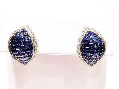 FRENCH CUT BLUE SAPPHIRES INVISIBLE SET WITH ROUND BRILLIANT DIAMOND
