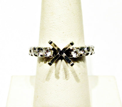 DIAMOND 18 ROUND BRILLIANT SETTING SMALL PORTION IN BACK FOR SIZE-ING