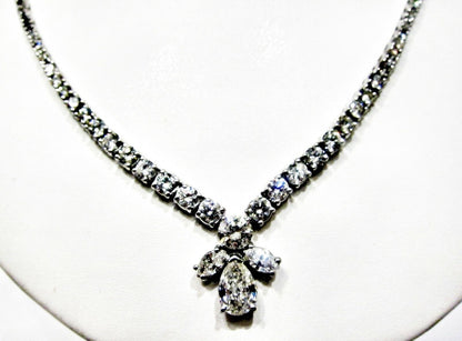 GIA CERTIFIED PEAR BRILLIANT SHAPE H SI1 SET WITH TWO