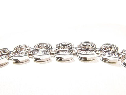 ROUND BRILLIANT BAGUETTE SHAPE DIAMOND CHANNEL SET DIAMOND TENNIS BRACELET