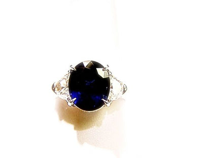 ONE OVAL BLUE SAPPHIRE SET WITH TWO HALF MOON DIAMONDS RING SAPPHIRE AND DIAMOND