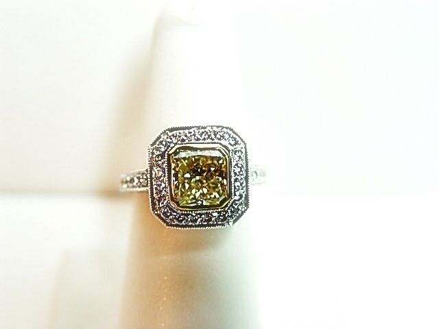 GIA CERTIFIED FANCY YELLOW COLOR GRADE SI1 CLARITY RADIANT 2.52 CT PLATINUM