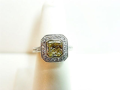 GIA CERTIFIED FANCY YELLOW COLOR GRADE SI1 CLARITY RADIANT 2.52 CT PLATINUM