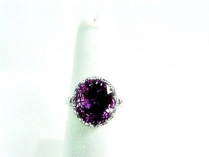 SAPPHIRE PINK OVAL SHAPE 10.86X 9.42X 4.83MM SET ROUND