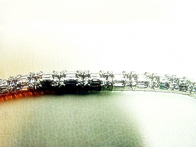 8.64 ct round brilliant baguette shape prong set G color VS1/2 clarity 18 k gold