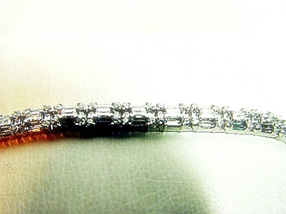 8.64 ct round brilliant baguette shape prong set G color VS1/2 clarity 18 k gold