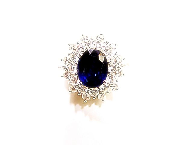 OVAL SAPPHIRE SET WITH ROUND BRILLIANT CUT DIAMONDS RING