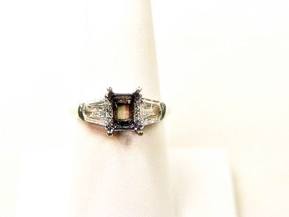 PLATINUM SETTING AND 2 NATURAL SHEILD CUT DIAMOND