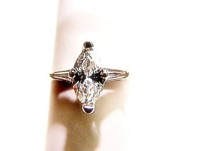 DIAMOND MARQUISE 10.80X5.20X3.00MM SET 2 TAPERED BAGUETTE SHAPE ENGAGEMENT RING