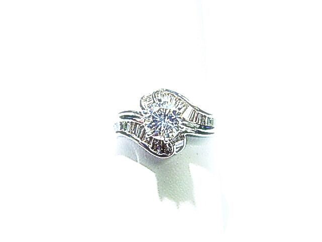 ROUND BRILLIANT SHAPE BAGUETTE SHAPE DIAMOND RING