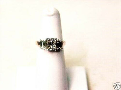 RADIANT CUT DIAMOND CENTER 4 PRONG SET 1.50 CT SIDES 2 SET
