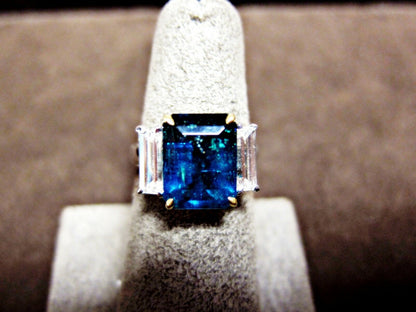 rectangular emerald 4.00 cttw diamond two emerald shape side diamond set ring