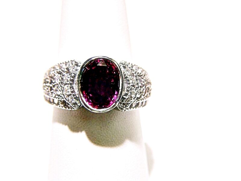 PINK SAPPHIRE OVAL CUT BEZEL SET 2.06 CT ROUND BRILLIANT SHAPE