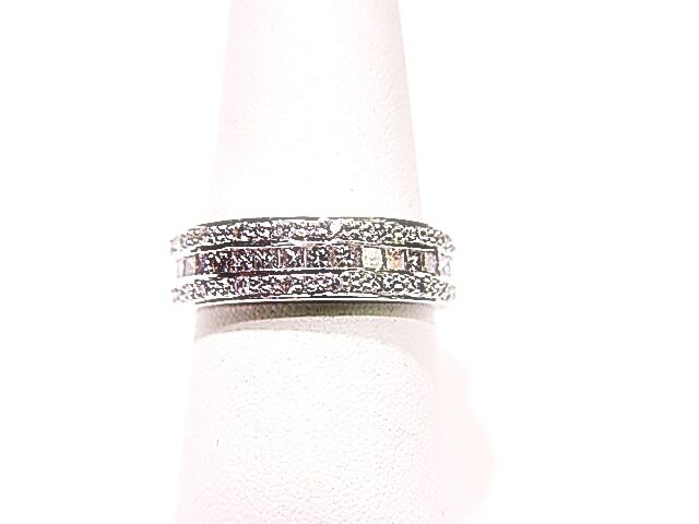 A ROW CENTER PRINCESS SHAPE SIDE 2 ROW ROUND BRILLIANT