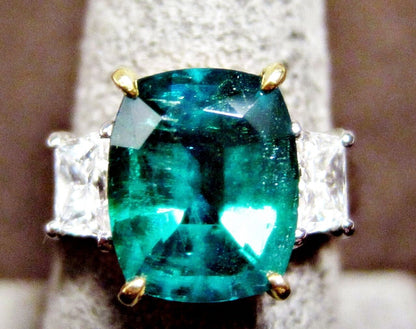 oval emerald 5.04 ct diamond two trapezoid brilliant set ring platinum