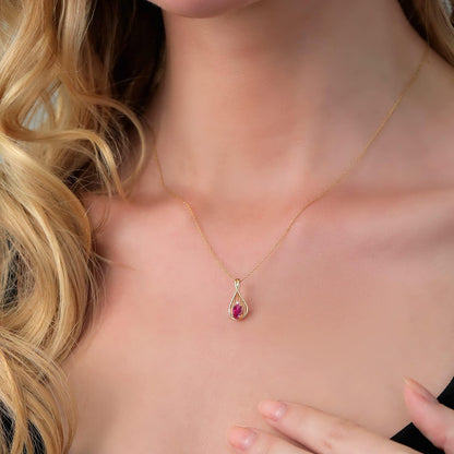 10K Yellow Gold Red Created Ruby and White Diamond Teardrop Pendant Necklace for Women (0.50 Cttw, Gemstone July Birthstone, Oval 6X4MM, with 18 Inch Chain)