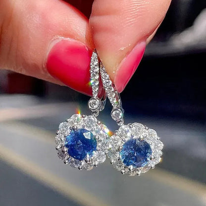 Exquisite and Fashion Silver Plated Blue Sapphire Pendant Lab Diamond Flower Hanging Earrings for Women Bridal Wedding Earrings
